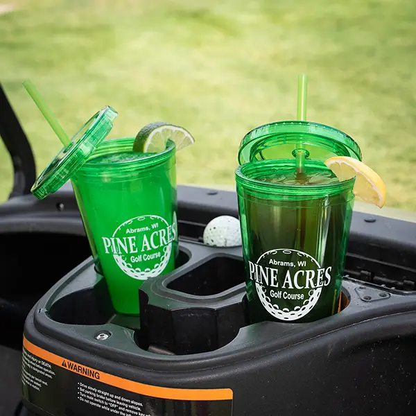 travel tumblers in a golf cart